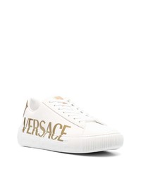 Baskets basses en cuir imprimées blanches Versace