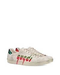 Baskets basses en cuir imprimées blanches Gucci