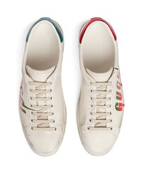 Baskets basses en cuir imprimées blanches Gucci