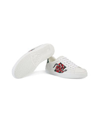 Baskets basses en cuir imprimées blanches Gucci