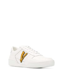 Baskets basses en cuir imprimées blanches Versace