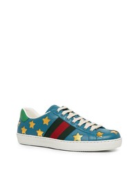 Baskets basses en cuir imprimées bleues Gucci