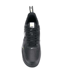 Baskets basses en cuir imprimées noires et blanches Nike