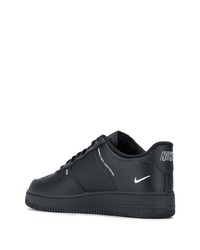 Baskets basses en cuir imprimées noires et blanches Nike