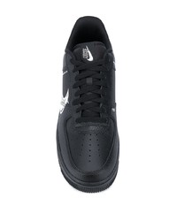 Baskets basses en cuir imprimées noires et blanches Nike