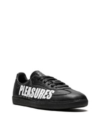 Baskets basses en cuir imprimées noires et blanches adidas