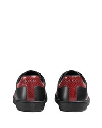 Baskets basses en cuir imprimées noires Gucci