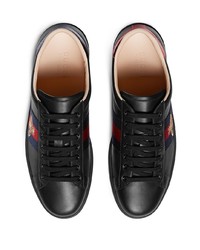 Baskets basses en cuir imprimées noires Gucci