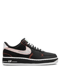 Baskets basses en cuir imprimées noires Nike