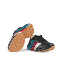 Baskets basses en cuir imprimées noires Gucci