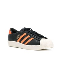 Baskets basses en cuir imprimées noires adidas