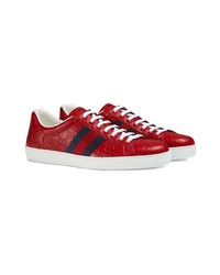 Baskets basses en cuir imprimées rouges Gucci