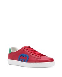 Baskets basses en cuir imprimées rouges Gucci