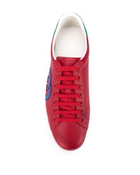 Baskets basses en cuir imprimées rouges Gucci