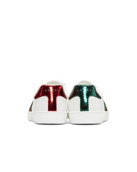 Baskets basses en cuir imprimées serpent blanches Gucci