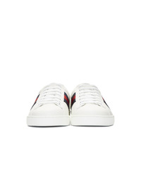 Baskets basses en cuir imprimées serpent blanches Gucci