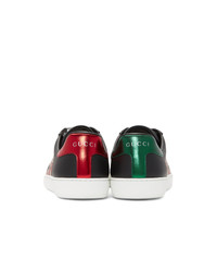 Baskets basses en cuir imprimées serpent noires Gucci