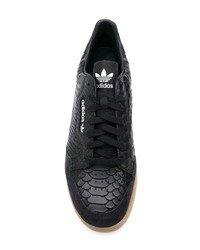 Baskets basses en cuir imprimées serpent noires adidas