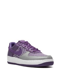 Baskets basses en cuir imprimées violettes Nike