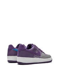 Baskets basses en cuir imprimées violettes Nike