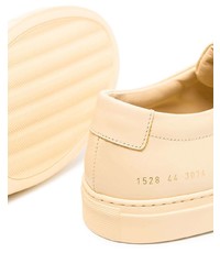 Baskets basses en cuir jaunes Common Projects