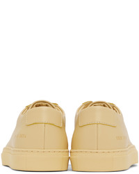 Baskets basses en cuir jaunes Common Projects