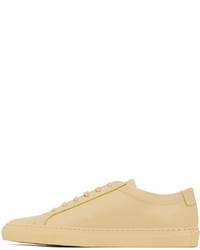 Baskets basses en cuir jaunes Common Projects