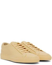 Baskets basses en cuir jaunes Common Projects