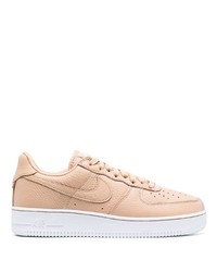 Baskets basses en cuir marron clair Nike