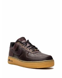 Baskets basses en cuir marron foncé Nike