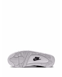 Baskets basses en cuir noires et blanches Nike