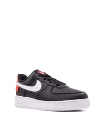 Baskets basses en cuir noires et blanches Nike