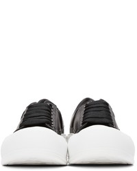 Baskets basses en cuir noires et blanches Alexander McQueen