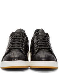 Baskets basses en cuir noires et blanches Alexander McQueen