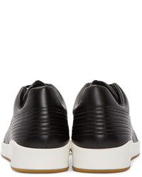 Baskets basses en cuir noires et blanches Alexander McQueen