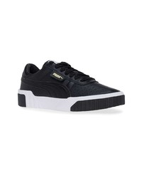 Baskets basses en cuir noires et blanches Puma