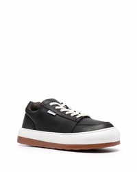 Baskets basses en cuir noires et blanches Sunnei