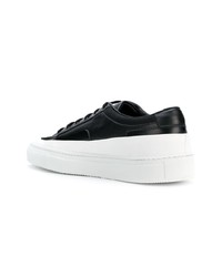 Baskets basses en cuir noires et blanches Common Projects