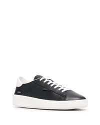 Baskets basses en cuir noires et blanches D.A.T.E