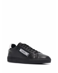 Baskets basses en cuir noires et blanches Moschino