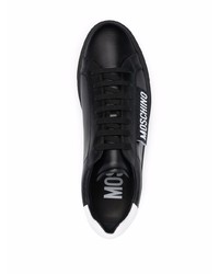 Baskets basses en cuir noires et blanches Moschino