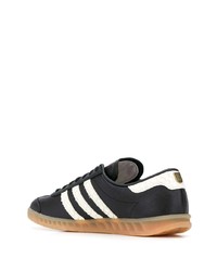 Baskets basses en cuir noires et blanches adidas