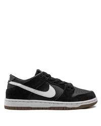 Baskets basses en cuir noires et blanches Nike