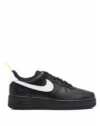 Baskets basses en cuir noires et blanches Nike