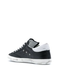 Baskets basses en cuir noires et blanches Philippe Model Paris