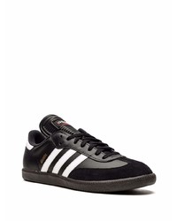 Baskets basses en cuir noires et blanches adidas