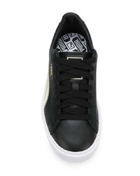 Baskets basses en cuir noires et blanches Puma