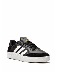 Baskets basses en cuir noires et blanches adidas