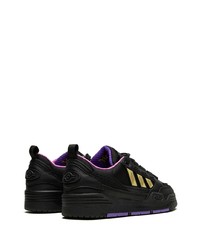 Baskets basses en cuir noires adidas