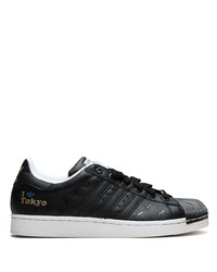 Baskets basses en cuir noires adidas